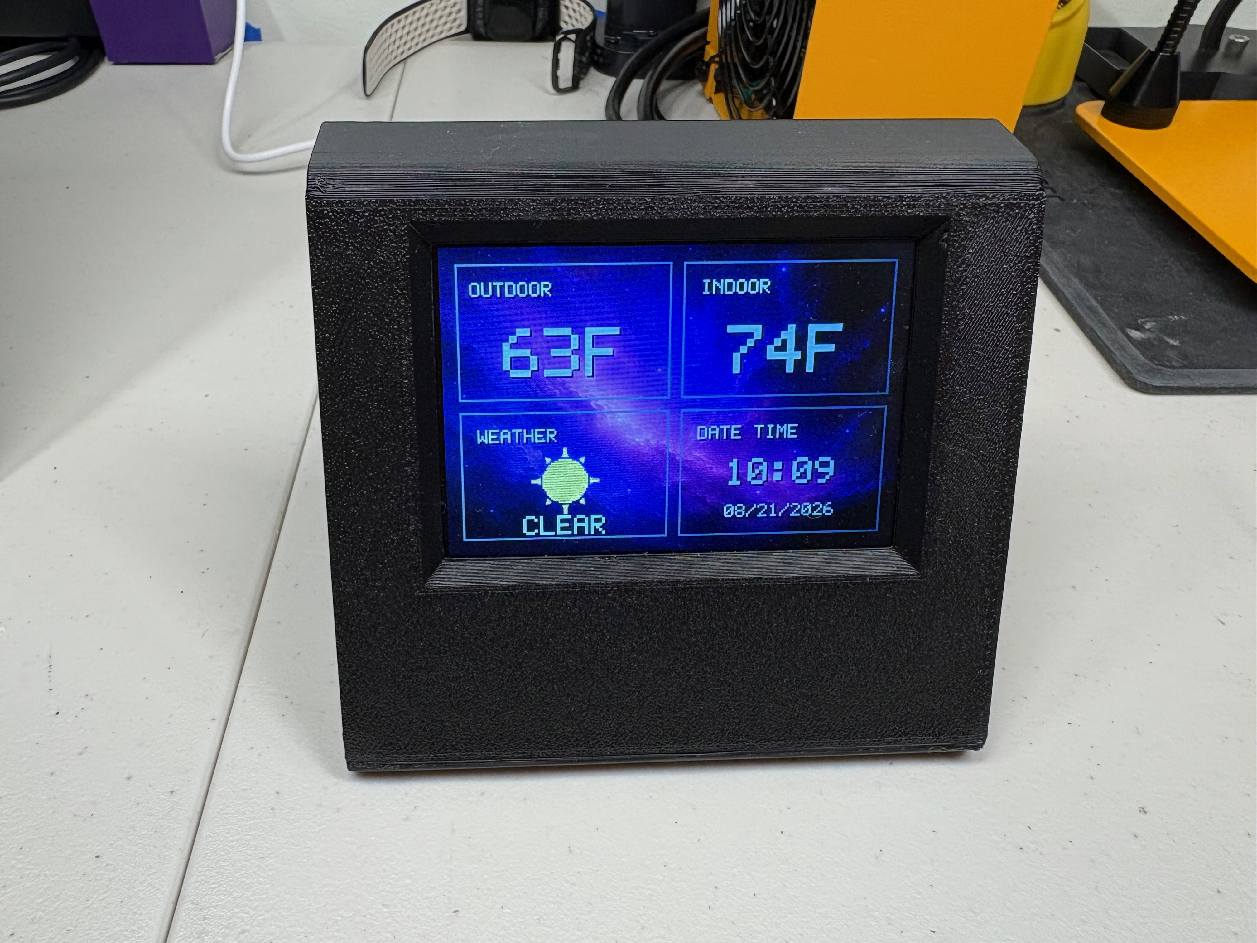 Front of finished Weather Buddy working on a desk
