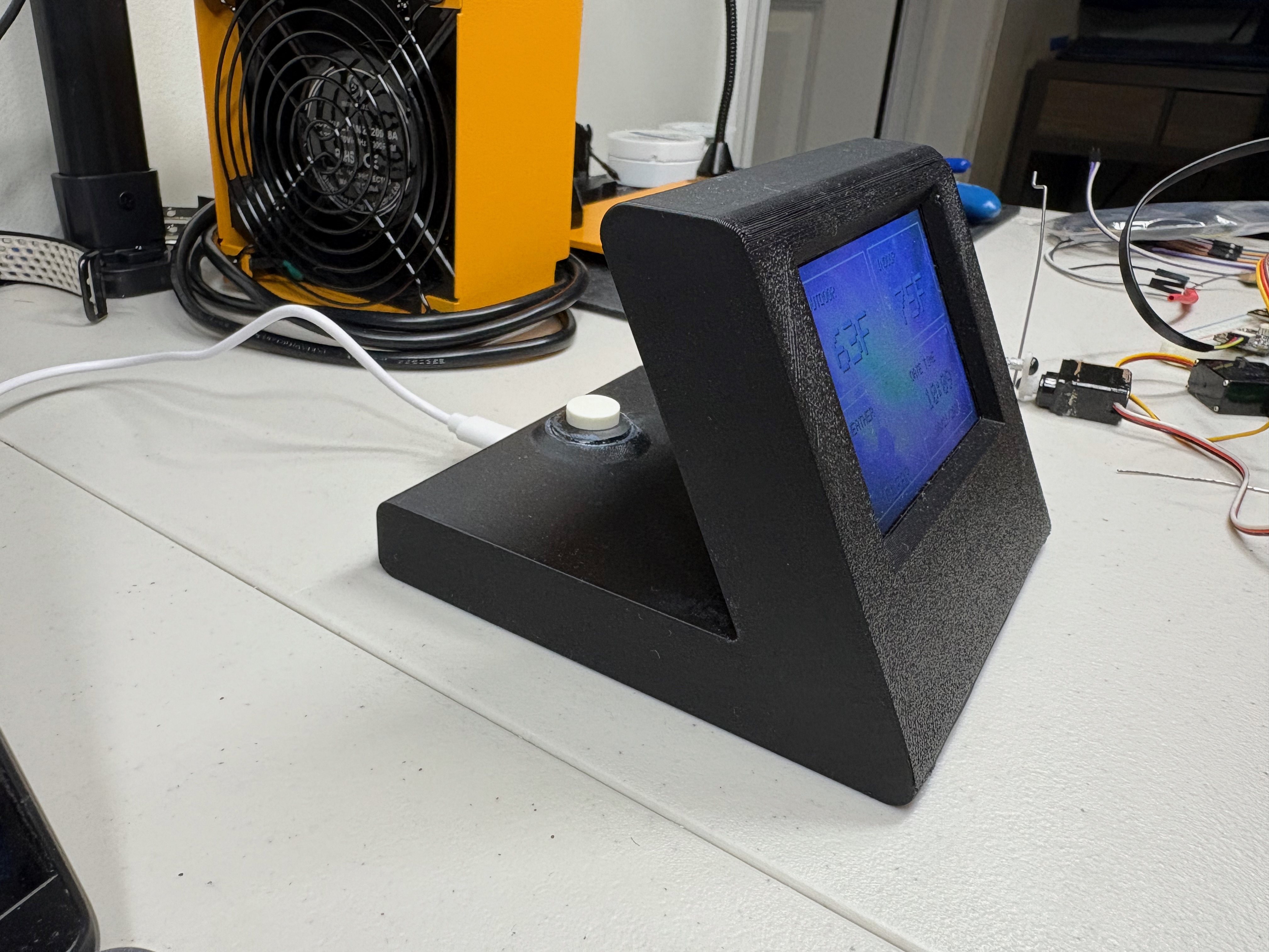 Side of finished Weather Buddy working on a desk